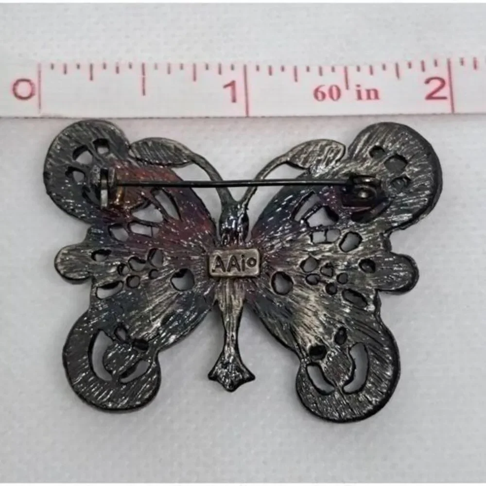 AAI butterfly brooch